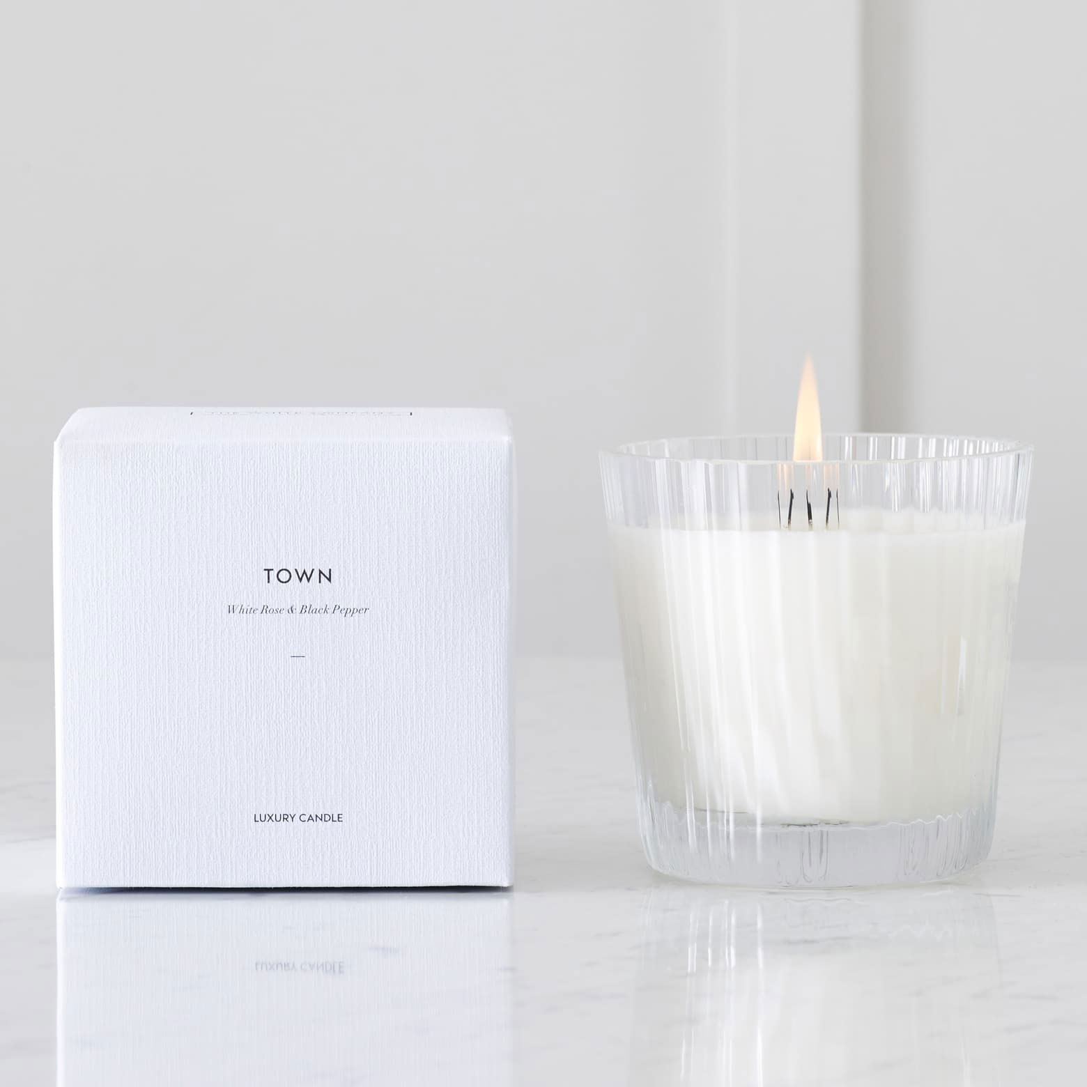 The White Company Ceramic Candle in White Rose and Spicy Black Pepper 